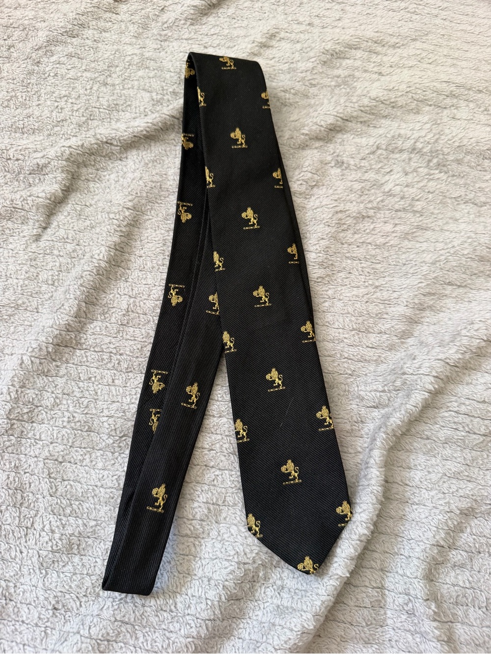 Black Tie with Gold Crest Pattern